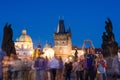 PRAGUE, CZECH REPUBLIC - MAY 2017: view on the Prague, Charles bridge, Lesser Bridge Tower, many tourists.