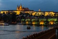 Prague, Czech Republic. Night photo of Charles Bridge, Castle and historical buildings Royalty Free Stock Photo