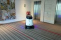 Gaussian Robotics Vacuum 40 robotic vacuum cleaner in a hotel lobby