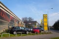 Opel cars in front of dealership building