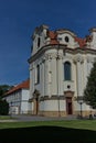 Baroque white benedictine monastery Brevnov with church.