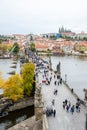 Prague, Czech Republic - October 09.2019: bell tower on the ancient Prague Charles Bridge crosses Vltava river