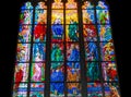 Colorful religious stained glass window, St. Vitus Cathedral in Royalty Free Stock Photo