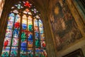 Colorful religious stained glass window, St. Vitus Cathedral in Royalty Free Stock Photo