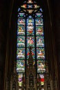 Colorful religious stained glass window in St. Vitus Cathedral i Royalty Free Stock Photo