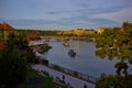 Panoramic view of Prague with boats and bridges on the Vltava river. Royalty Free Stock Photo