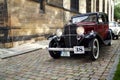 Vintage American Nash car next to a church in Prague, Czech Republic