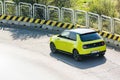 Prague, Czech republic - October 02, 2020. Yellow green electric Honda E - view on the back of car