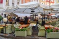 PRAGUE, CZECH REPUBLIC - OKTOBER 10, 2018: Cafe with umbrellas and wicker chairs on the street of Prague