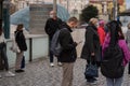 People on a winter day facing quarantine. Man, woman, mums, child, old and young people outdoors. Prague 6 Royalty Free Stock Photo