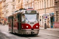 Prague, Czech Republic. Public Old Retro Tram Of Route Number Seven With Female Woman Driver Moving