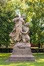 sculpture of slavic mythical figures - statues of Ctirad and Sarka on pedestal in Vysehrad, Prague, Czech republic