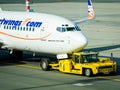 Prague, Czech Republic - September 17, 2012. Airplane navigated by assitance at Vaclav Havel Airport Royalty Free Stock Photo