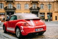 Back View Of Red Volkswagen New Beetle Cabriolet Car Parked In Street. Royalty Free Stock Photo