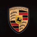 Close Logo Logotype Sign Of Porsche On Black Background