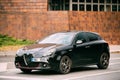 Side View Of Alfa Romeo Giulietta Veloce 940 Car Of Black Metallic Royalty Free Stock Photo