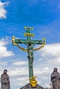 Statuary of St. Cross - Calvary - in Charles bridge, Prague Royalty Free Stock Photo