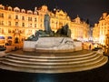 Statue and memorial of Jan Hus in wide perspective. Christmass time in old Prague Royalty Free Stock Photo