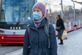 11/16/2020. Prague. Czech Republic. A woman wearing a mask at Hradcanska tram stop during quarantine