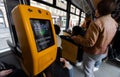Yellow ticket validator inside Prague tram Royalty Free Stock Photo