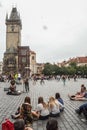 Selective blur on singers and musicians playing accordion with crowd of tourists on Old Town Square Staromestske Namesti