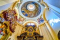 The colorful circular fresco on the dome in small chapel of Loreta complex, on March 11 in Prague, Czechia