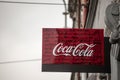 Coca Cola logo on a bar, a reseller.