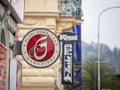 Gambrinus logo in front of a local retailer bar in Prague.