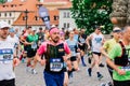 Prague, Czechia - 7th May 2023 - Group athletes runners run marathon in sunlight