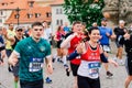 Prague, Czechia - 7th May 2023 - Group athletes runners run marathon in sunlight