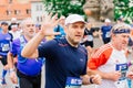 Prague, Czechia - 7th May 2023 - Group athletes runners run marathon in sunlight