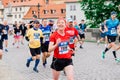 Prague, Czechia - 7th May 2023 - Group athletes runners run marathon in sunlight