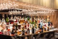 Prague - December. 12, 2023: Bottles of whiskey rum and other spirits in the restaurant bar. A large assortment of alcoholic