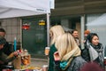 Prague, December 18, 2017: People shoppers walk around the annual popular Christmas designer street market called the