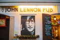 Prague, December 14, 2016: Sights of Prague. John Lennon`s pub with portrait of musician and menu with Christmas Royalty Free Stock Photo