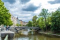 Prague embankment on a summer day. Panorama of the city. Beautiful buildings