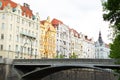Prague embankment on a summer day. Panorama of the city. Beautiful buildings