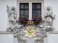 Prague, House of the Golden Well, Madonna and Child surrounded by saints Royalty Free Stock Photo