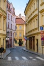 A quiet street with zebra crossing in the old town district of Prague, Czech Republic Royalty Free Stock Photo