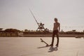 Prague metronom view with skateboarding young man at Letna district