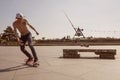 Prague metronom view with skateboarding young man at Letna district