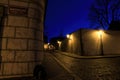 Old lanterns illuminating a dark alleyway Royalty Free Stock Photo