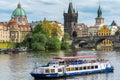 Prague old town,  iconic Charles bridge over Vltava river, and cruise ship in Prague, Czech Republic Royalty Free Stock Photo