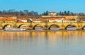Prague panoramic view of the bridge of the carla river vltava ships in the background of the hill and old houses. Czech Republic