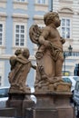 Prague, sculpture of a plump baby angel