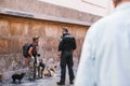 Prague, September 29, 2017: A policeman talks to a homeless person or checks his documents.