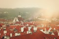 Prague tile roofs of old houses, view from above. vintage and mostalgic style photo Royalty Free Stock Photo