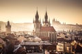 Prague towers of Old Town with Tyn church aerial view and Prague Castle, sunset, golden light, travel to Prague Royalty Free Stock Photo