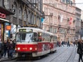 Prague tram, or called Prazske tramvaje, Tatra T3 model, in the old town, crowded with commuters.