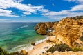 Praia da Marinha, beautiful beach Marinha in Algarve, Portugal. Navy Beach (Praia da Marinha) with flying seagulls Royalty Free Stock Photo